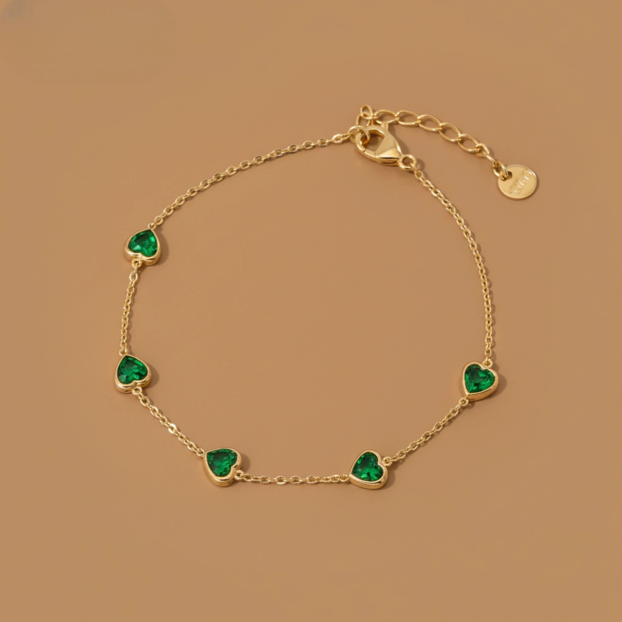 Gold Bracelet with Green Heart Charms for women