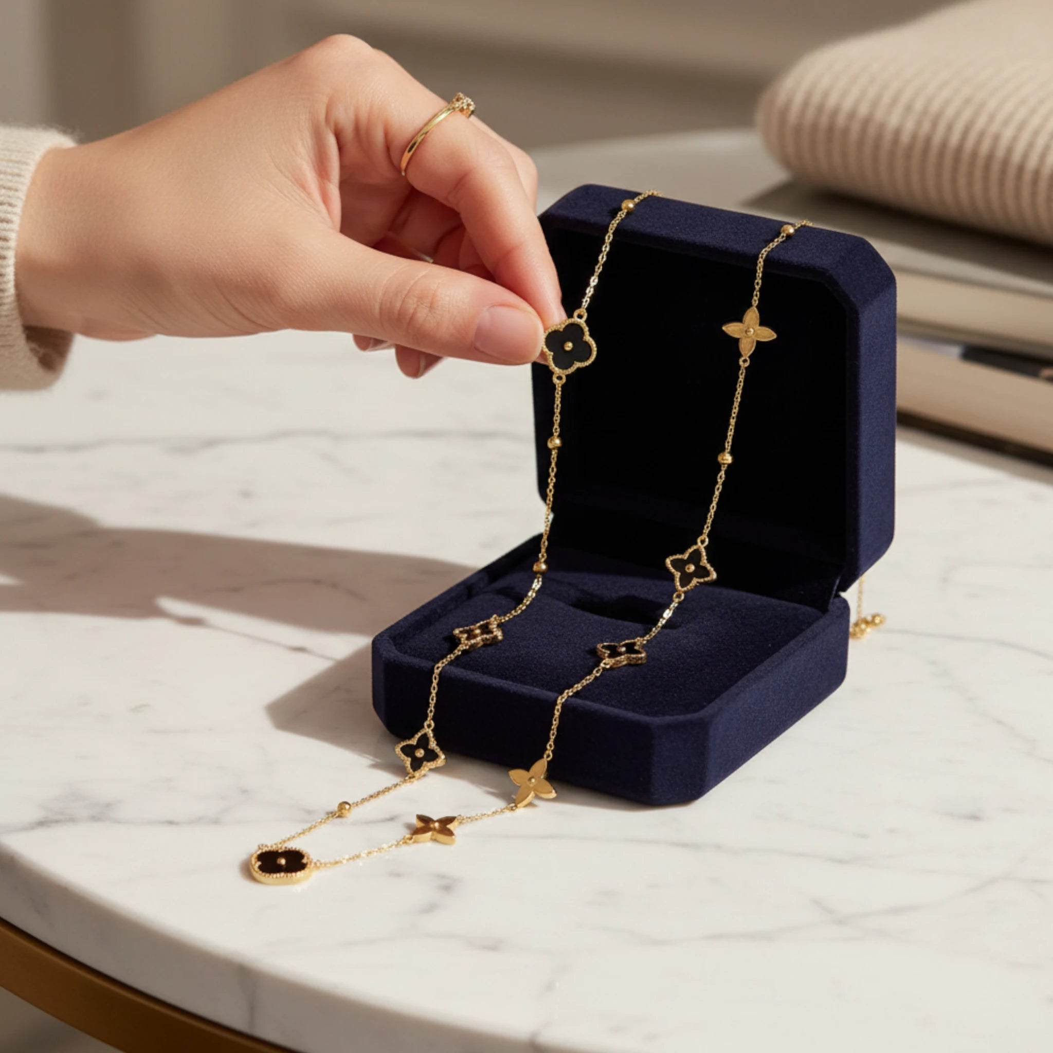 Gold Necklace with Black Clover Pendants