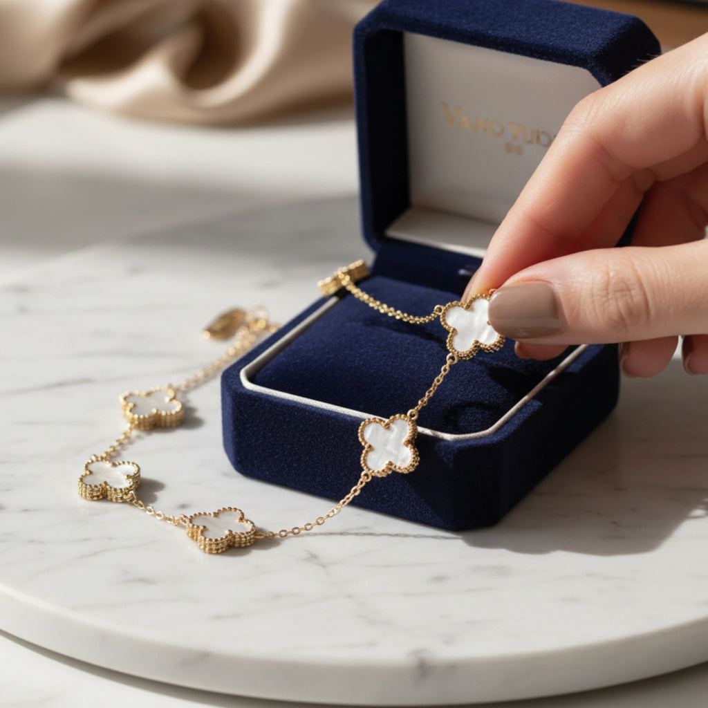 Gold Clover Charm Bracelet with White Inlay Accents